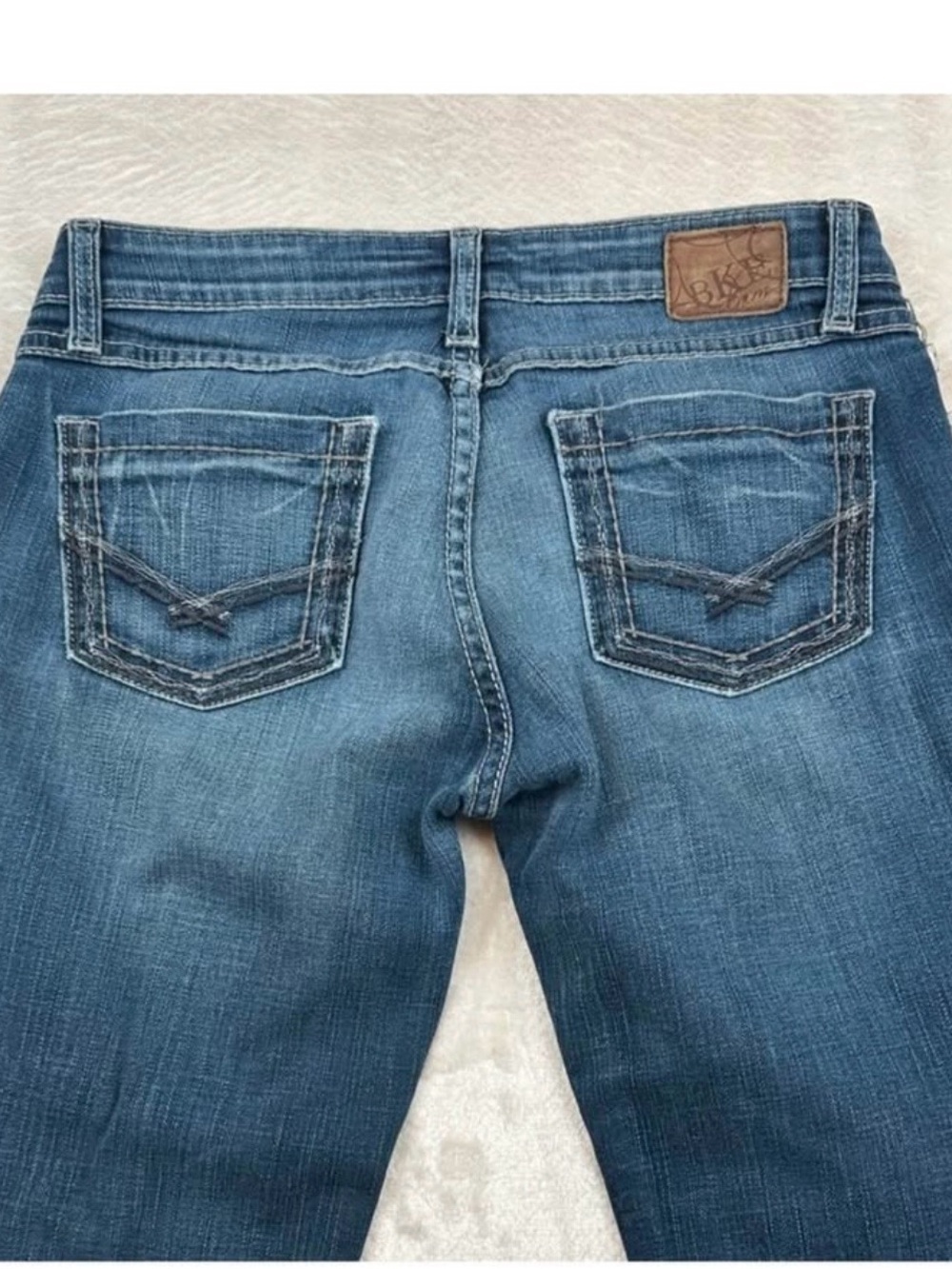 Buckle Women's Medium Blue Straight Leg Jeans with Embroidered Back Pockets